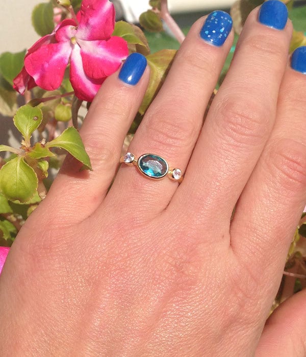 Blue Topaz Ring - December Birthstone - Bezel Set Ring with Oval Blue Topaz Gemstone and Clear Quartz Accents - H.L.Jewelry