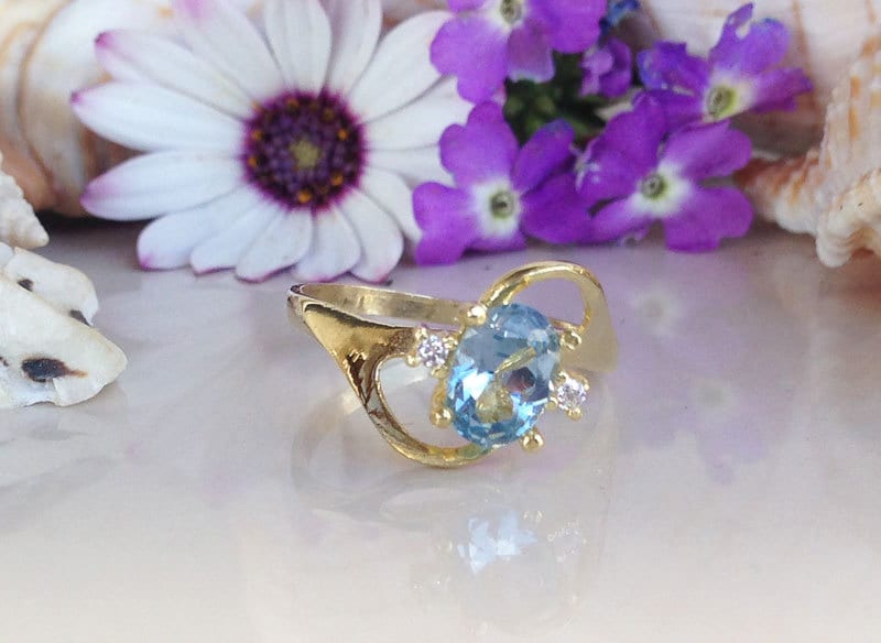 Blue Topaz Ring - December Birthstone - Tiny Delicate Ring with Oval Blue Topaz Gemstone and Clear Quartz Accents - H.L.Jewelry