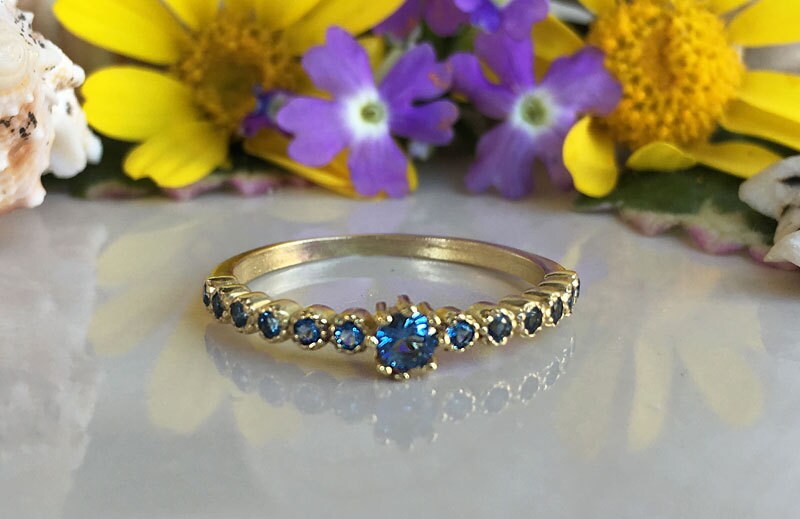 Blue Topaz Ring - December Birthstone  - Delicate Stacking Half Eternity Ring with Thirteen Round Blue Topaz Gemstones - H.L.Jewelry