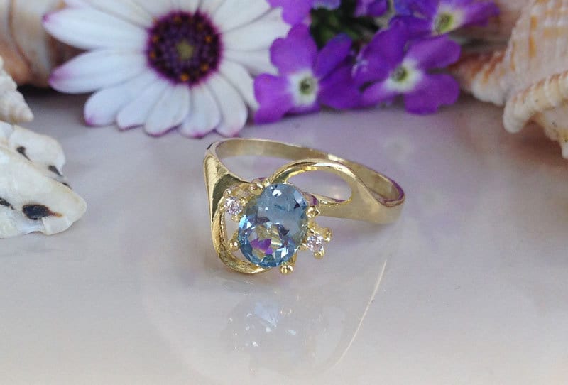 Blue Topaz Ring - December Birthstone - Tiny Delicate Ring with Oval Blue Topaz Gemstone and Clear Quartz Accents - H.L.Jewelry